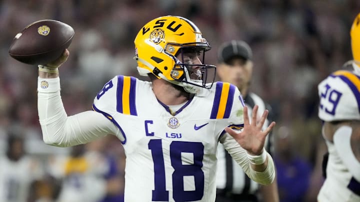 Nov 8, 2025; Tuscaloosa, Alabama, USA;  LSU quarterback Garrett Nussmeier (18) throws a pass during the second half of the game with Alabama at Saban Field at Bryant-Denny Stadium. Alabama defeated LSU 20-9. Mandatory Credit: Gary Cosby Jr.-Imagn Images