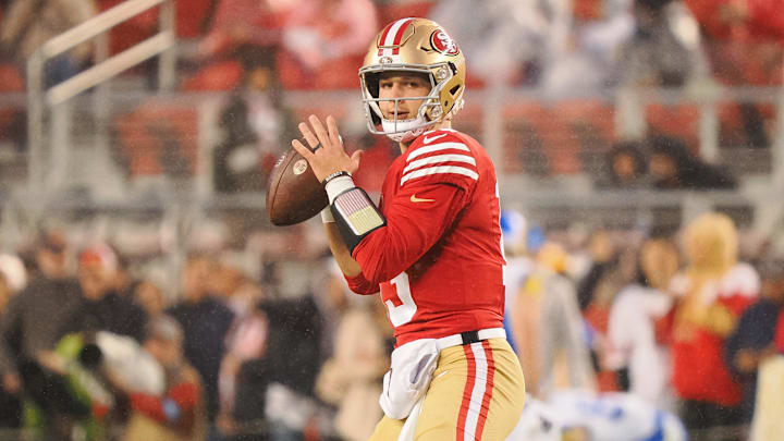 Dec 12, 2024; Santa Clara, California, USA; San Francisco 49ers quarterback Brock Purdy (13) warms up before the game against the Los Angeles Rams at Levi's Stadium. Mandatory Credit: Kelley L Cox-Imagn Images Dec 12, 2024; Santa Clara, California, USA; San Francisco 49ers quarterback Brock Purdy (13) warms up before the game against the Los Angeles Rams at Levi's Stadium. Mandatory Credit: Kelley L Cox-Imagn Images