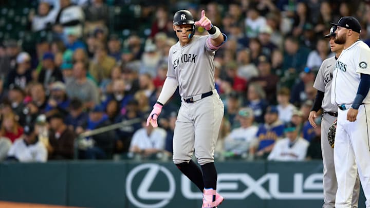 May 14, 2025; Seattle, Washington, USA; New York Yankees designated hitter Aaron Judge (99) stands on first after his single against the Seattle Mariners during the first inning at T-Mobile Park. Mandatory Credit: John Froschauer-Imagn Images