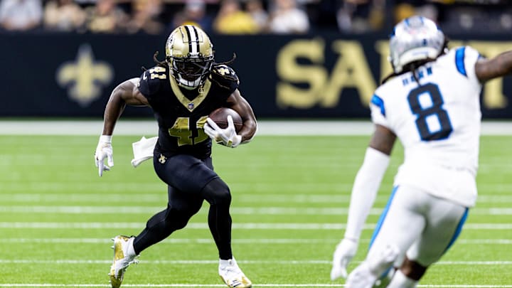 Sep 8, 2024; New Orleans, Louisiana, USA; New Orleans Saints running back Alvin Kamara (41) runs against Carolina Panthers cornerback Jaycee Horn (8) during the first half at Caesars Superdome. Mandatory Credit: Stephen Lew-Imagn Images Sep 8, 2024; New Orleans, Louisiana, USA; New Orleans Saints running back Alvin Kamara (41) runs against Carolina Panthers cornerback Jaycee Horn (8) during the first half at Caesars Superdome. Mandatory Credit: Stephen Lew-Imagn Images