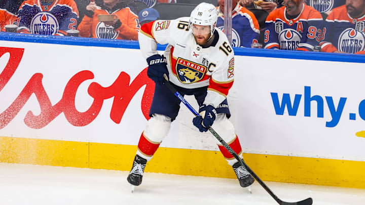Jun 14, 2025; Edmonton, Alberta, CAN; Florida Panthers center Aleksander Barkov (16) controls the puck against the Edmonton Oilers during the second period in game five of the 2025 Stanley Cup Final at Rogers Place. Mandatory Credit: Sergei Belski-Imagn Images