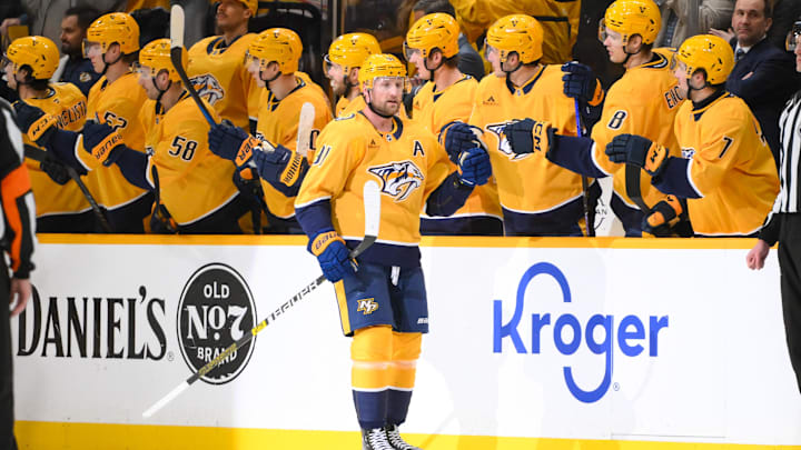 Apr 8, 2025; Nashville, Tennessee, USA; Nashville Predators center Steven Stamkos (91) celebrates his goal with his teammates  against the New York Islanders  during the second period at Bridgestone Arena. Mandatory Credit: Steve Roberts-Imagn Images