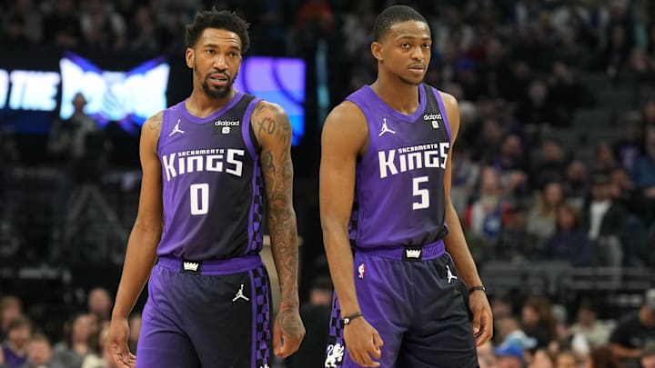 Mar 10, 2024; Sacramento, California, USA; Sacramento Kings guards Malik Monk (0) and De'Aaron Fox (5) during the first quarter against the Houston Rockets at Golden 1 Center. Mandatory Credit: Darren Yamashita-USA TODAY Sports