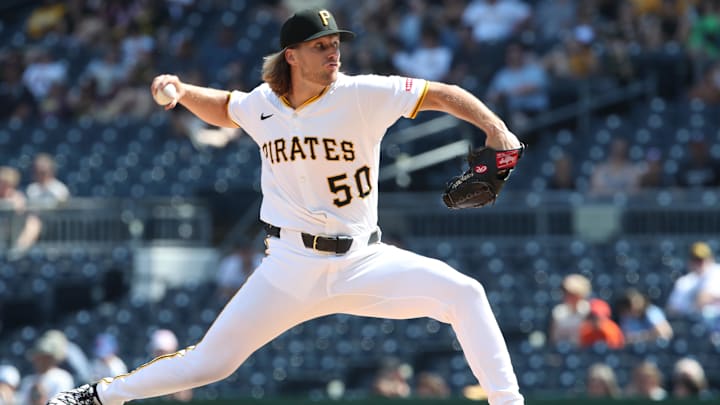 Jun 29, 2025; Pittsburgh, Pennsylvania, USA;  Pittsburgh Pirates relief pitcher Carmen Mlodzinski (50) pitches against the New York Mets during the ninth inning at PNC Park. Mandatory Credit: Charles LeClaire-Imagn Images