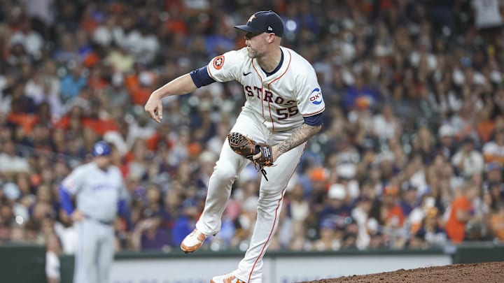 Aug 31, 2024; Houston, Texas, USA; Houston Astros relief pitcher Ryan Pressly (55) delivers a pitch during the ninth inning against the Kansas City Royals at Minute Maid Park. 