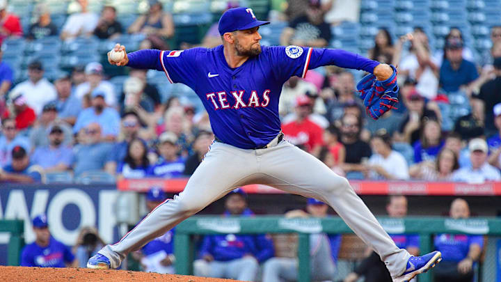 Jul 8, 2025; Anaheim, California, USA; Texas Rangers pitcher Nathan Eovaldi (17) throws against the Los Angeles Angels during the first inning at Angel Stadium. 