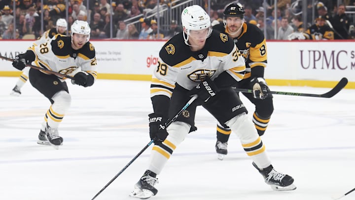 Apr 13, 2025; Pittsburgh, Pennsylvania, USA; Boston Bruins center Morgan Geekie (39) skates with the puck against the Pittsburgh Penguins during the second period at PPG Paints Arena. Mandatory Credit: Charles LeClaire-Imagn Images Apr 13, 2025; Pittsburgh, Pennsylvania, USA; Boston Bruins center Morgan Geekie (39) skates with the puck against the Pittsburgh Penguins during the second period at PPG Paints Arena. Mandatory Credit: Charles LeClaire-Imagn Images