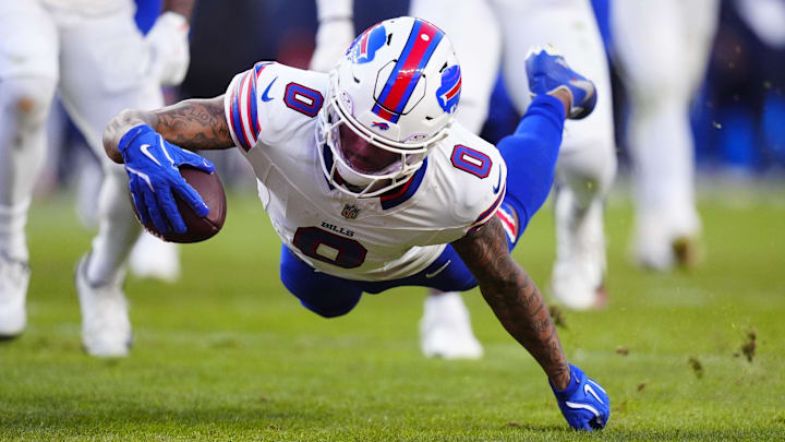 Jan 17, 2026; Denver, CO, USA; Buffalo Bills wide receiver Keon Coleman (0) scores a touchdown during the third quarter of an AFC Divisional Round playoff game against the Denver Broncos at Empower Field at Mile High.