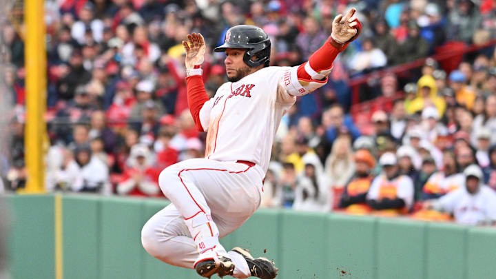 May 3, 2026; Boston, Massachusetts, USA; Boston Red Sox first baseman Willson Contreras (40) slides into second base during the seventh inning against the Houston Astros at Fenway Park. Mandatory Credit: Eric Canha-Imagn Images