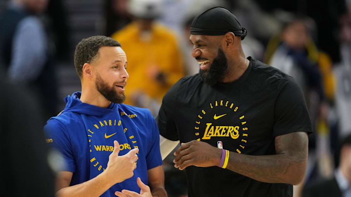 Golden State Warriors guard Stephen Curry and Los Angeles Lakers forward LeBron James on Dec 25, 2024.