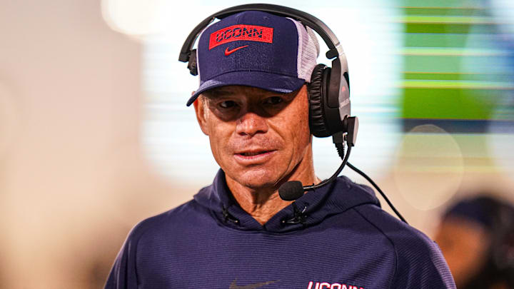 Oct 26, 2024; East Hartford, Connecticut, USA; Connecticut Huskies head coach Jim Mora watches from the sideline as they take on the Rice Owls at Rentschler Field at Pratt & Whitney Stadium. Mandatory Credit: David Butler II-Imagn Images Oct 26, 2024; East Hartford, Connecticut, USA; Connecticut Huskies head coach Jim Mora watches from the sideline as they take on the Rice Owls at Rentschler Field at Pratt & Whitney Stadium. Mandatory Credit: David Butler II-Imagn Images