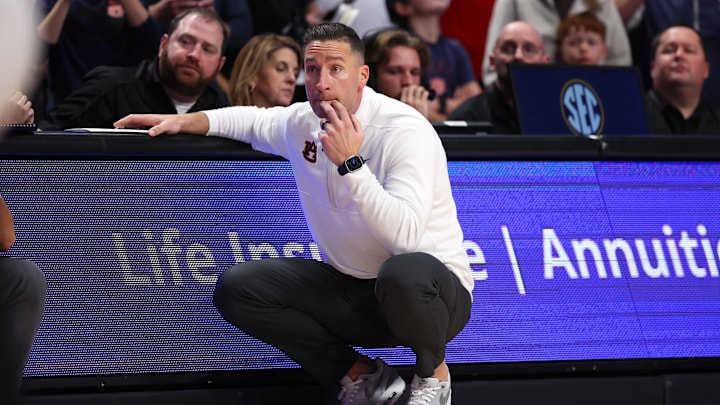 Nov 16, 2025; Birmingham, Alabama, USA; Auburn Tigers head coach Steven Pearl watches nervously during the second half against the Houston Cougars at Legacy Arena at BJCC. Mandatory Credit: David Leong-Imagn Images