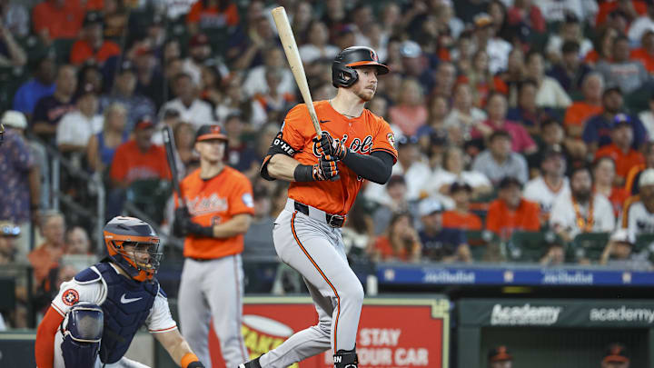 Jun 22, 2024; Houston, Texas, USA; Baltimore Orioles left fielder Ryan O'Hearn (32) hits a single during the third inning against the Houston Astros at Minute Maid Park. Jun 22, 2024; Houston, Texas, USA; Baltimore Orioles left fielder Ryan O'Hearn (32) hits a single during the third inning against the Houston Astros at Minute Maid Park.