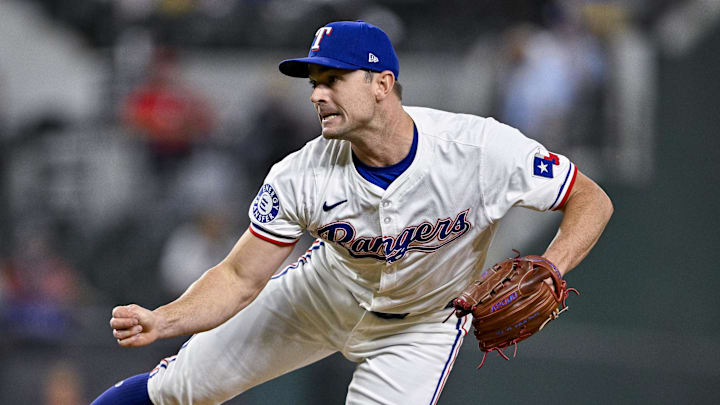 Sep 5, 2024; Arlington, Texas, USA; Texas Rangers relief pitcher David Robertson (37) pitches against the Los Angeles Angels during the game at Globe Life Field. Mandatory Credit: Jerome Miron-Imagn Images