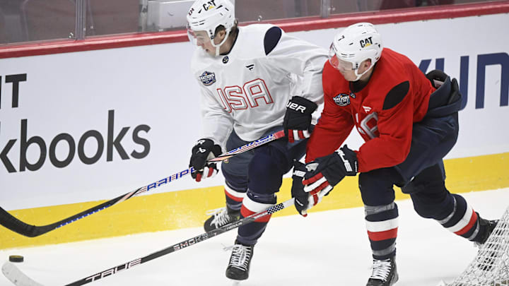Team USA's Brady Tkachuk and Charlie McAvoy (white) during training for the 4 Nations Face-Off. 