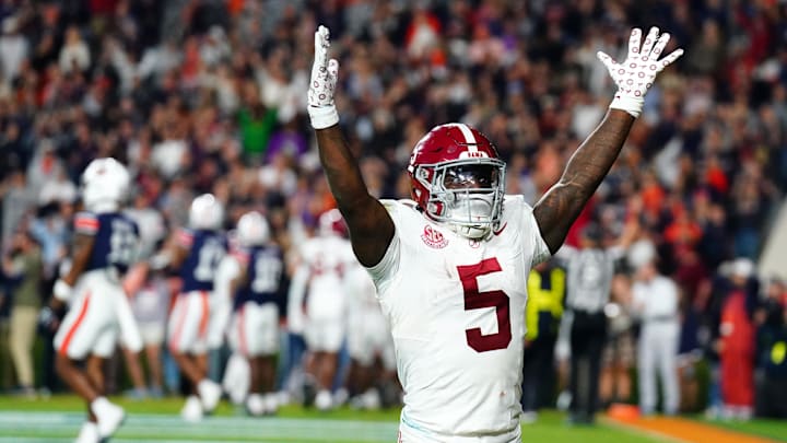 Nov 25, 2023; Auburn, Alabama, USA; Alabama Crimson Tide running back Roydell Williams (5) celebrates the game winning touchdown by teammate Alabama Crimson Tide wide receiver Isaiah Bond (17) during the fourth quarter against the Auburn Tigers at Jordan-Hare Stadium. Mandatory Credit: John David Mercer-Imagn Images Nov 25, 2023; Auburn, Alabama, USA; Alabama Crimson Tide running back Roydell Williams (5) celebrates the game winning touchdown by teammate Alabama Crimson Tide wide receiver Isaiah Bond (17) during the fourth quarter against the Auburn Tigers at Jordan-Hare Stadium. Mandatory Credit: John David Mercer-Imagn Images