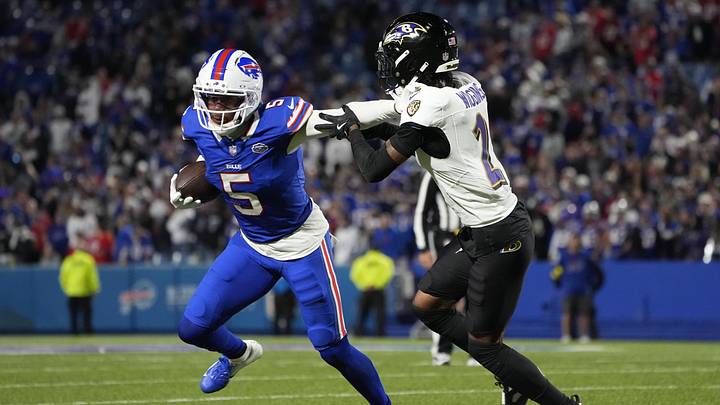 Buffalo Bills wide receiver Joshua Palmer (5) runs the ball against Baltimore Ravens cornerback Nate Wiggins (2) during the fourth quarter at Highmark Stadium. Buffalo Bills wide receiver Joshua Palmer (5) runs the ball against Baltimore Ravens cornerback Nate Wiggins (2) during the fourth quarter at Highmark Stadium.
