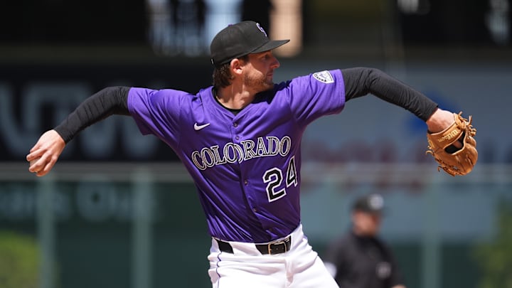 Denver, Colorado, USA; Colorado Rockies third base Ryan McMahon (24) fields the ball seventh inning against the Detroit Tigers at Coors Field. Denver, Colorado, USA; Colorado Rockies third base Ryan McMahon (24) fields the ball seventh inning against the Detroit Tigers at Coors Field.