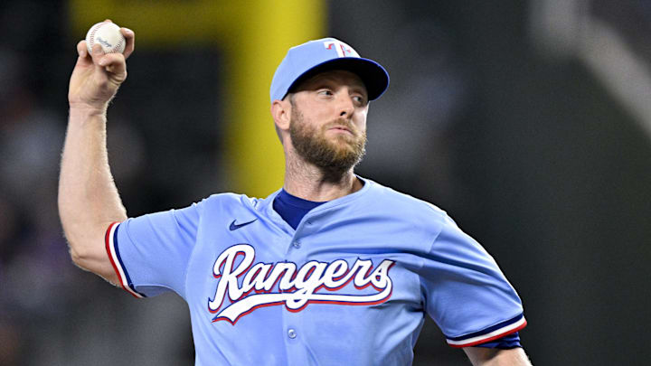 Sep 21, 2025; Arlington, Texas, USA; Texas Rangers starting pitcher Merrill Kelly (23) throws the ball during the first inning against the Miami Marlins at Globe Life Field. Mandatory Credit: Jerome Miron-Imagn Images