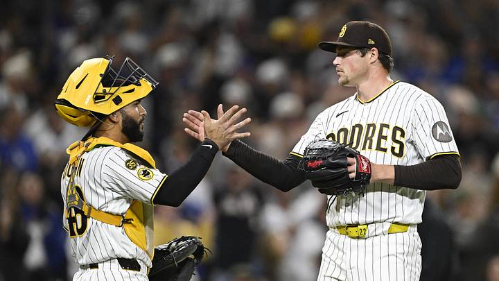 May 18, 2026; San Diego, California, USA; San Diego Padres pitcher Mason Miller (22), right, is congratulated by catcher Rodolfo Duran (48) after the Padres beat the Los Angeles Dodgers at Petco Park. Mandatory Credit: Denis Poroy-Imagn Images