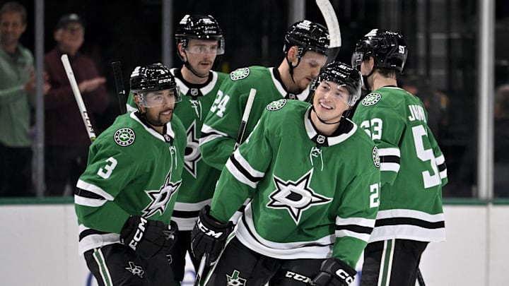 Nov 20, 2024; Dallas, Texas, USA; Dallas Stars defenseman Mathew Dumba (3) and center Wyatt Johnston (53) and left wing Jason Robertson (21) and defenseman Thomas Harley (55) and center Roope Hintz (24) celebrates a goal scored by Robertson against the San Jose Sharks during the first period at the American Airlines Center. Mandatory Credit: Jerome Miron-Imagn Images