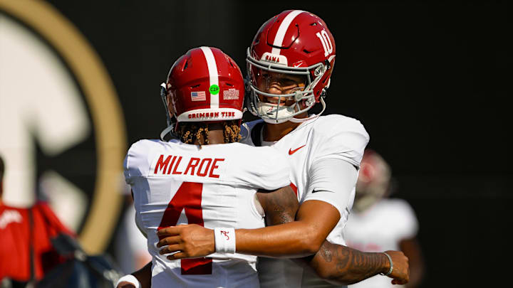 Crimson Tide quarterbacks Jalen Milroe (4) and Austin Mack embrace before playing Vanderbilt. Crimson Tide quarterbacks Jalen Milroe (4) and Austin Mack embrace before playing Vanderbilt.