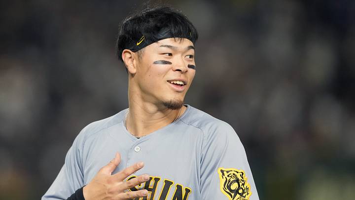 Mar 15, 2025; Bunkyo, Tokyo, Japan; Hanshin Tigers right fielder Teruaki Sato (8) during the fifth inning against the Chicago Cubs at Tokyo Dome. Mandatory Credit: Darren Yamashita-Imagn Images Mar 15, 2025; Bunkyo, Tokyo, Japan; Hanshin Tigers right fielder Teruaki Sato (8) during the fifth inning against the Chicago Cubs at Tokyo Dome. Mandatory Credit: Darren Yamashita-Imagn Images