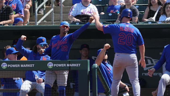 Apr 13, 2025; West Sacramento, California, USA; New York Mets first baseman Pete Alonso (20) is congratulated by shortstop Francisco Lindor (12) after scoring a run against the Athletics during the sixth inning at Sutter Health Park. Mandatory Credit: Darren Yamashita-Imagn Images