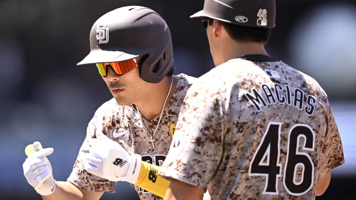 Jul 7, 2024; San Diego, California, USA; San Diego Padres shortstop Ha-Seong Kim (7) celebrates after hitting a single against the Arizona Diamondbacks during the fifth inning at Petco Park. Mandatory Credit: Orlando Ramirez-USA TODAY Sports