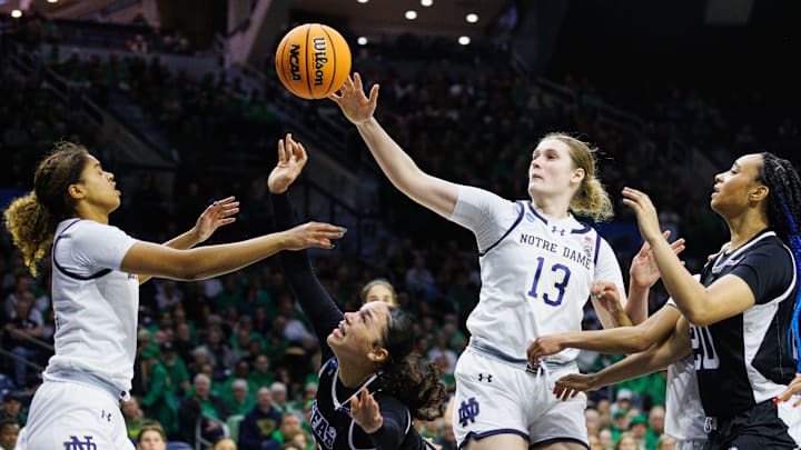 Notre Dame forward Kate Koval (13) goes after a loose ball during the first round of the NCAA Women's Basketball Tournament between Notre Dame and Stephen F. Austin at Purcell Pavilion on Friday, March 21, 2025, in South Bend. Notre Dame forward Kate Koval (13) goes after a loose ball during the first round of the NCAA Women's Basketball Tournament between Notre Dame and Stephen F. Austin at Purcell Pavilion on Friday, March 21, 2025, in South Bend.