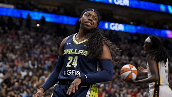 Aug 1, 2025; Dallas, Texas, USA; Dallas Wings guard Arike Ogunbowale (24) in action during the game between the Dallas Wings and the Indiana Fever at the American Airlines Center. Mandatory Credit: Jerome Miron-Imagn Images