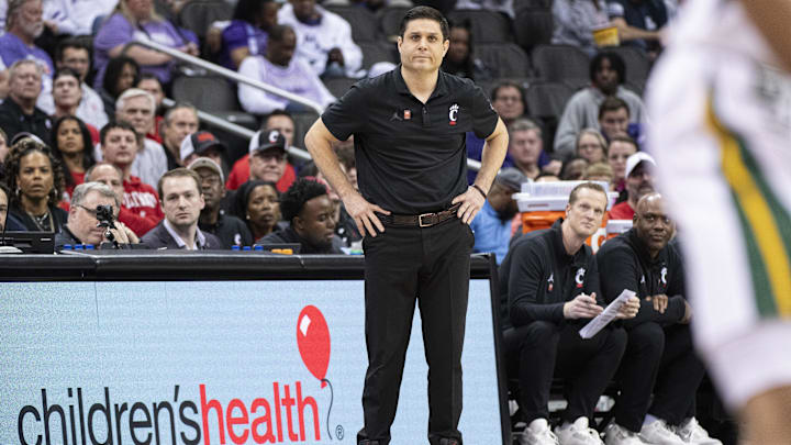 Mar 14, 2024; Kansas City, MO, USA; Cincinnati Bearcats head coach Wes Miller looks on during the first half against the Baylor Bears at T-Mobile Center. Mandatory Credit: Amy Kontras-Imagn Images
