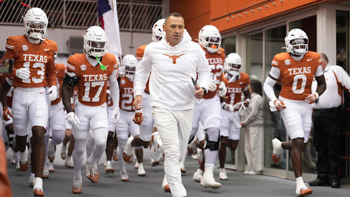 Nov 1, 2025; Austin, Texas, USA; Texas Longhorns head coach Steve Sarkisian leads his team on to the field before a game against the Vanderbilt Commodores at Darrell K Royal-Texas Memorial Stadium. Mandatory Credit: Scott Wachter-Imagn Images Nov 1, 2025; Austin, Texas, USA; Texas Longhorns head coach Steve Sarkisian leads his team on to the field before a game against the Vanderbilt Commodores at Darrell K Royal-Texas Memorial Stadium. Mandatory Credit: Scott Wachter-Imagn Images