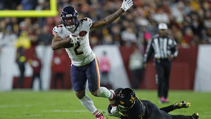 DJ Moore escapes for big yardage on a short pass in Monday night's Bears win. Moore had to go to the hospital after the game.
