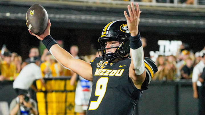Aug 28, 2025; Columbia, Missouri, USA; Missouri Tigers quarterback Beau Pribula (9) celebrates after scoring a touchdown against the Central Arkansas Bears during the second half of the game at Faurot Field at Memorial Stadium. Mandatory Credit: Denny Medley-Imagn Images