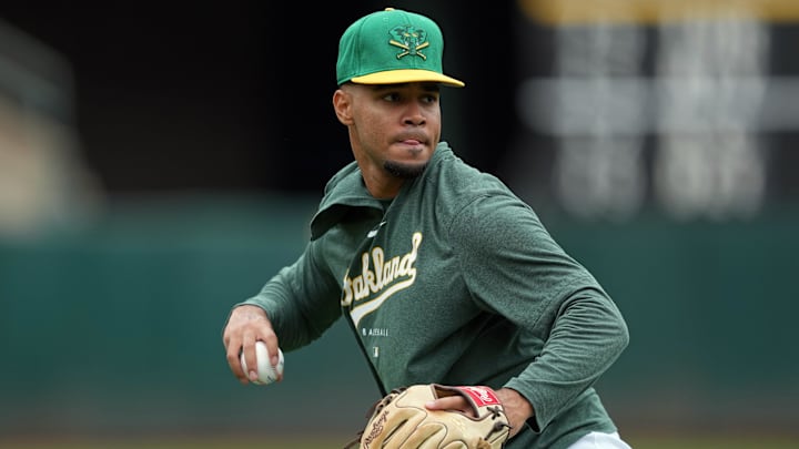 Aug 4, 2024; Oakland, California, USA; Oakland Athletics second baseman Darell Hernaiz (2) warms up before the game against the Los Angeles Dodgers at Oakland-Alameda County Coliseum. Mandatory Credit: Darren Yamashita-Imagn Images