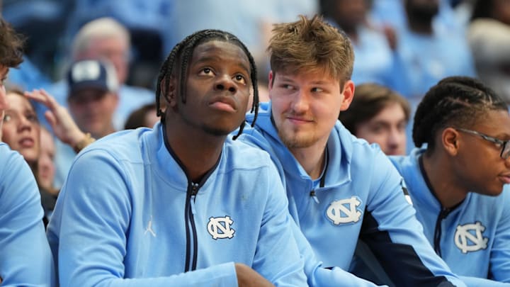 Feb 14, 2026; Chapel Hill, North Carolina, USA; North Carolina Tar Heels forward Caleb Wilson (8) and center Henri Veesaar (13) on the bench in the second half at Dean E. Smith Center. Mandatory Credit: Bob Donnan-Imagn Images Feb 14, 2026; Chapel Hill, North Carolina, USA; North Carolina Tar Heels forward Caleb Wilson (8) and center Henri Veesaar (13) on the bench in the second half at Dean E. Smith Center. Mandatory Credit: Bob Donnan-Imagn Images