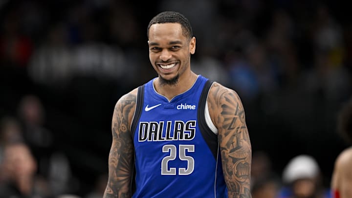 Mar 21, 2025; Dallas, Texas, USA; Dallas Mavericks forward P.J. Washington (25) smiles for the fans during the second half of the game against the Detroit Pistons at the American Airlines Center. Mandatory Credit: Jerome Miron-Imagn Images