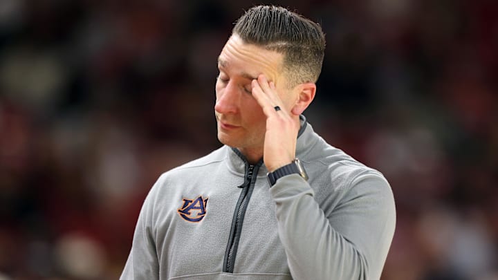 Feb 14, 2026; Fayetteville, Arkansas, USA; Auburn Tigers head coach Steven Pearl reacts to a play during the second half against the Arkansas Razorbacks at Bud Walton Arena. Mandatory Credit: Nelson Chenault-Imagn Images
