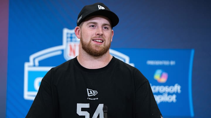 Feb 28, 2026; Indianapolis, IN, USA; Washington offensive lineman Carver Willis (OL54) speaks to members of the media during the NFL Combine at the Indiana Convention Center. Mandatory Credit: Jacob Musselman-Imagn Images