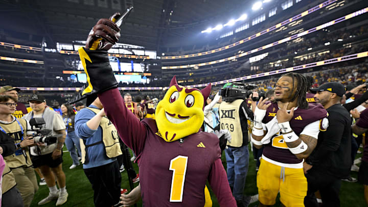 Dec 7, 2024; Arlington, TX, USA; The Arizona State Sun Devils mascot celebrates after the Sun Devils defeat the Iowa State Cyclones at AT&T Stadium. Mandatory Credit: Jerome Miron-Imagn Images