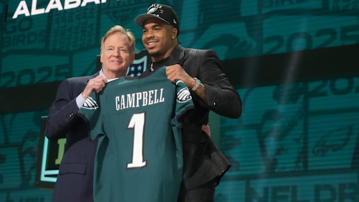 Apr 24, 2025; Green Bay, WI, USA; NFL commissioner Roger Goodell with Alabama Crimson Tide linebacker Jihaad Campbell after he is selected by the Philadelphia Eagles as the number 31 pick in the first round of the 2025 NFL Draft at Lambeau Field. Mandatory Credit: Kirby Lee-Imagn Images