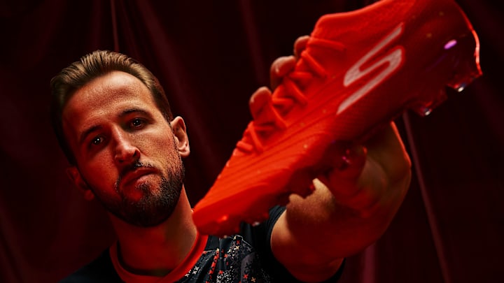 Harry Kane holds his first signature boot with Skechers.