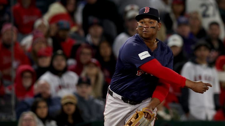 Apr 5, 2024; Anaheim, California, USA; Boston Red Sox third baseman Rafael Devers (11) throws to
