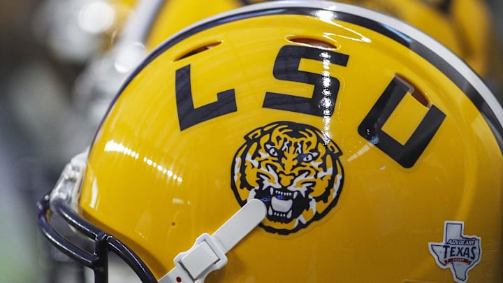LSU is ready to bring on a former national champion player to help coach its defensive line.