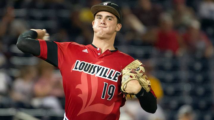 Jun 14, 2014; Omaha, NE, USA; Louisville Cardinals pitcher Nick Burdi (19) throws to first base against the Vanderbilt Commodores during game two of the 2014 College World Series at TD Ameritrade Park Omaha. Vanderbilt defeated Louisville 5-3. Mandatory Credit: Steven Branscombe-USA TODAY Sports