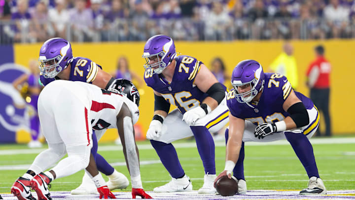 Vikings center Ryan Kelly (78) lines up next to right guard Will Fries (76) and right tackle Brian O'Neill (75). 