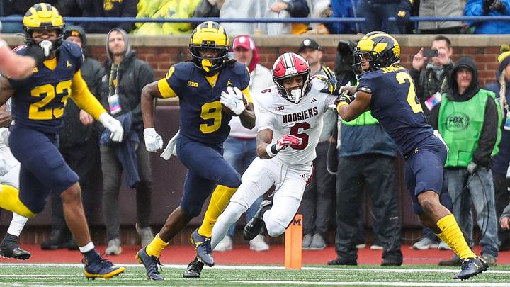Michigan defensive back Rod Moore runs after intercepting a pass vs. Indiana during the first half at Michigan Stadium Michigan defensive back Rod Moore runs after intercepting a pass vs. Indiana during the first half at Michigan Stadium
