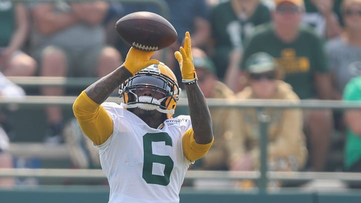 Green Bay Packers wide receiver Mecole Hardman (6) catches a pass at training camp.