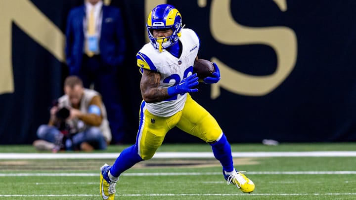 Dec 1, 2024; New Orleans, Louisiana, USA;  Los Angeles Rams running back Kyren Williams (23) rushes against the New Orleans Saints during the first half at Caesars Superdome. Mandatory Credit: Stephen Lew-Imagn Images